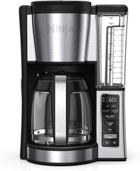 Programmable coffee machine, featuring two brewing modes, adjustable pre-heating plate and delayed brewing function