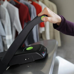 Digital steam press, featuring multiple fabric setting functions and steam impact function, made of stainless steel / black.