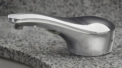 Automatic liquid soap dispenser, with a top-mounted contactless soap nozzle, capacity 34 ounces (1.0 liters), can be placed on the countertop of a public restroom, installation diameter 1-3/8 inches, chrome surface treatment.